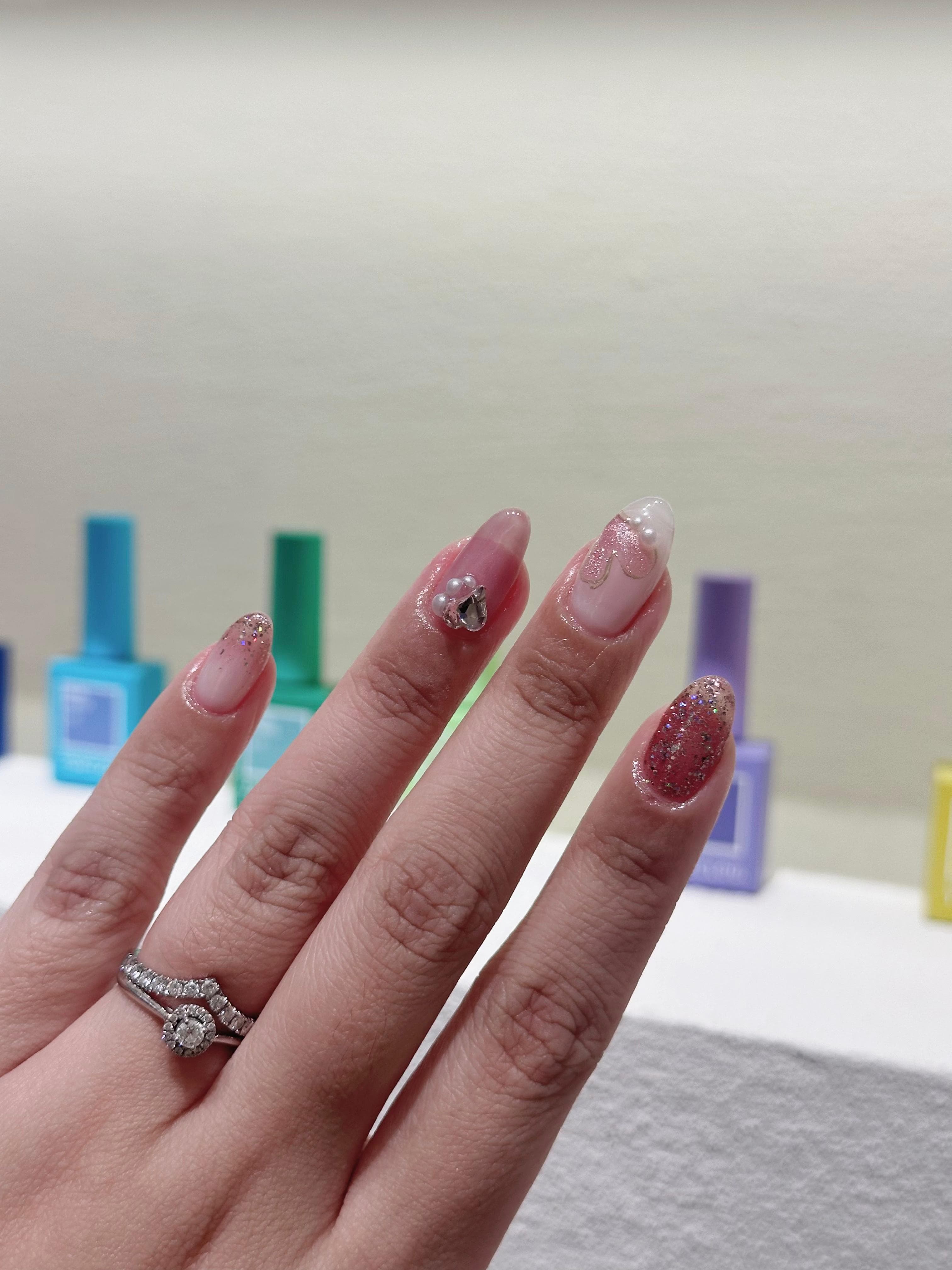 Soft pink charm nails